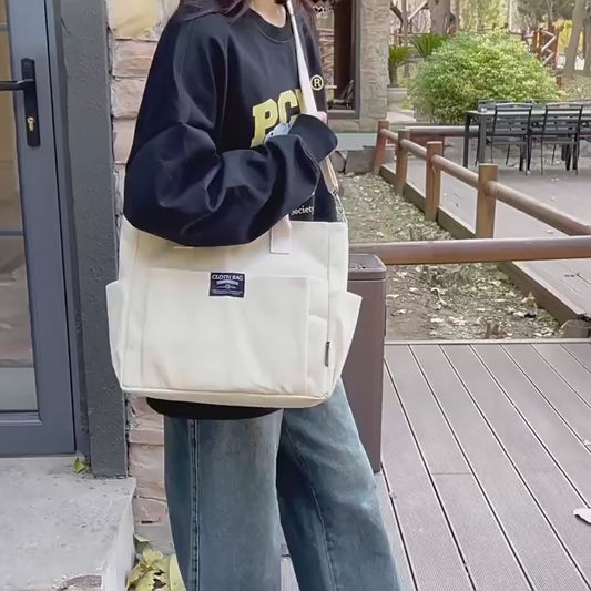 Urban minimalist women's student large capacity traveling horizontal canvas single shoulder diagonal cross-portable bag